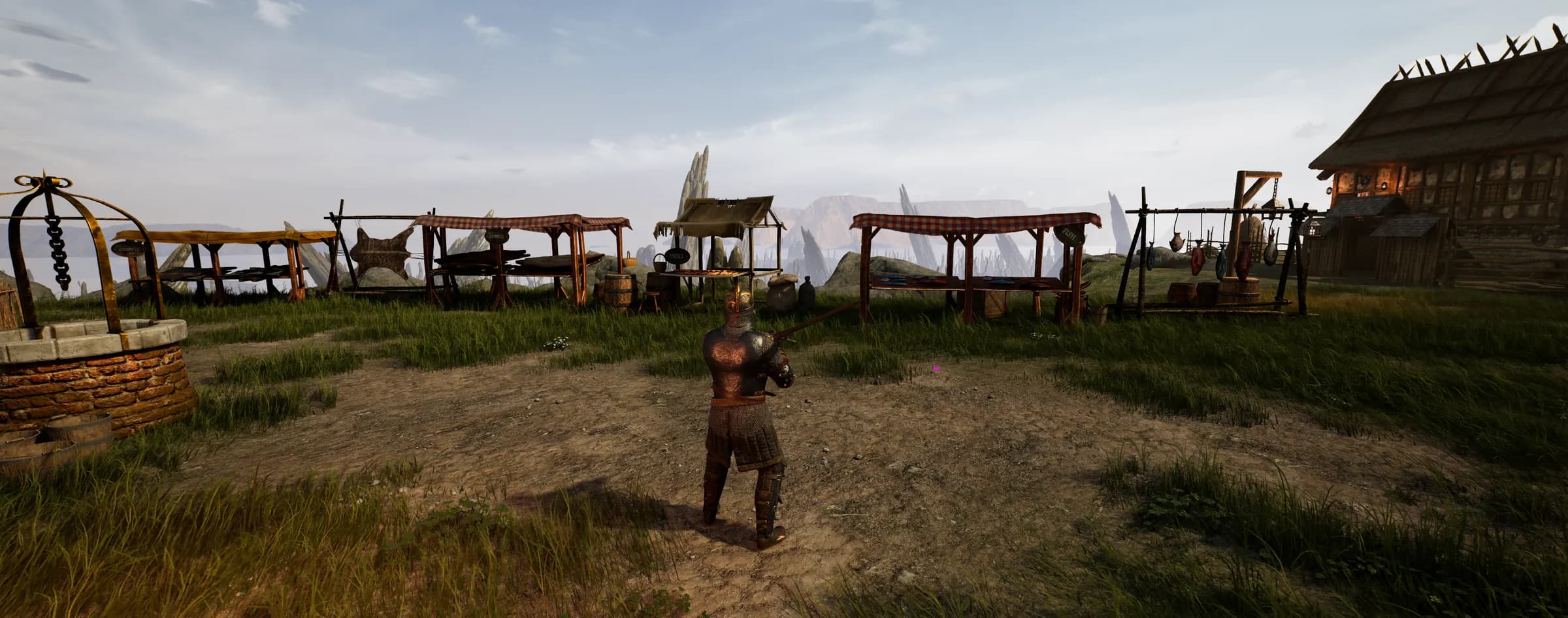 A warrior standing among market stalls and a stone well at the edge of town